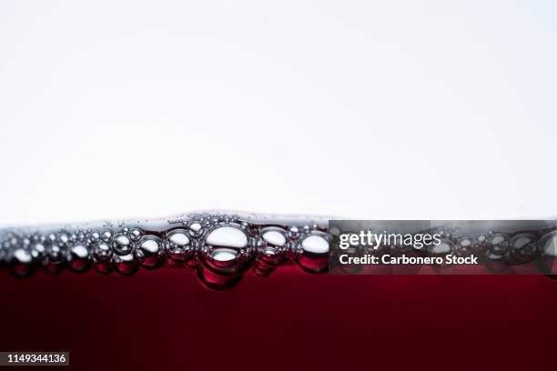 wonderful red wine bubbles - wine close up stock pictures, royalty-free photos & images