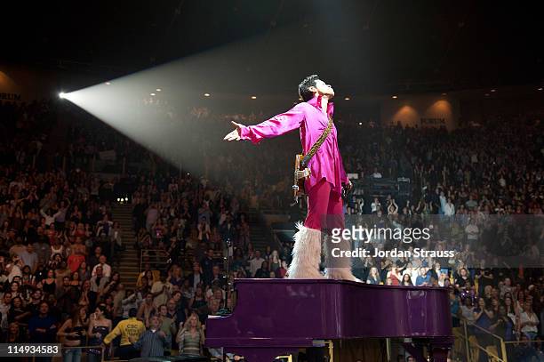 Musician Prince performs onstage during the "Welcome 2 America" Tour at The Forum on May 29, 2011 in Inglewood, California.