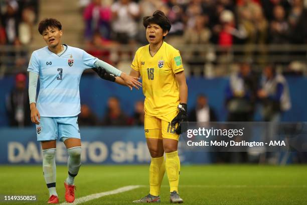 Dejected Natthakarn Chinwong of Thailand and Sukanya Chor Charoenying of Thailand during the 2019 FIFA Women's World Cup France group F match between...