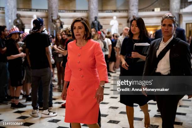Speaker of the House Nancy Pelosi, walks through Statuary Hall in the U.S. Capitol Building to attend a vote on Capitol Hill on June 11, 2019 in...
