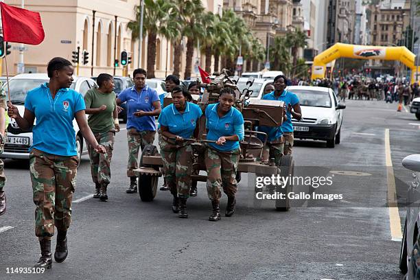 Women soldiers from the Air Defence Artillery School in Kimberly compete in the City of Cape Town artillery gun race on May 28 2011 in Cape Town,...