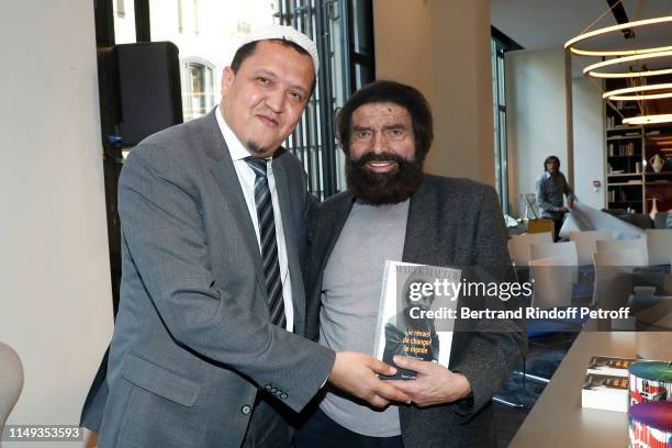 Imam Hassen Chalghoumi and Marek Halter attend Marek Halter presents his memoirs "I dreamed of changing the world" and the Todiebook circular book...