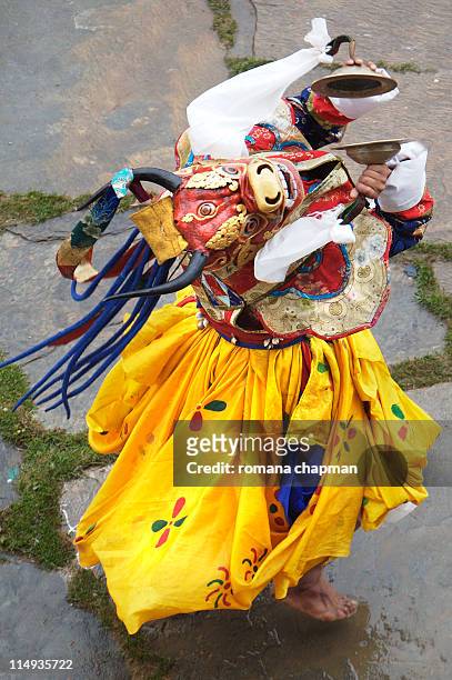 temple dancer dancing ritual - bumthang stock-fotos und bilder