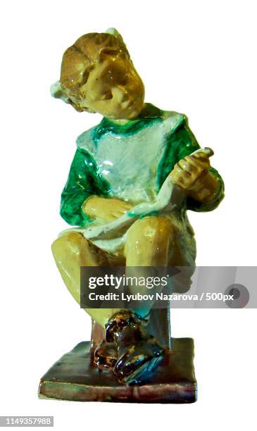 figurine - girl reading a book - 1950 2016 stock pictures, royalty-free photos & images