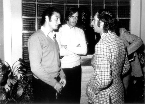 Coach of Estudiantes Carlos Bilardo talks with Hugo Pena player of River Plate and Cesar Luis Menotti coach of Huracan at AFA headquarters on...