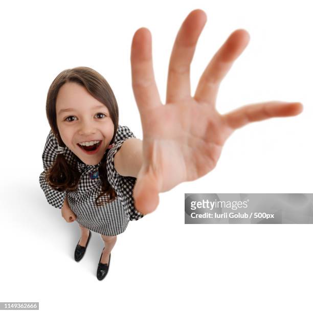 girl reaching out her hand - fish eye stock pictures, royalty-free photos & images