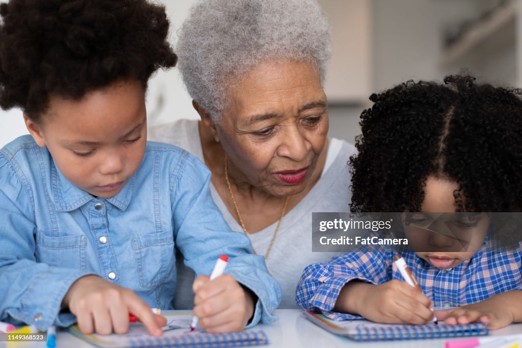 Black Grandma drawing With Grandchildren