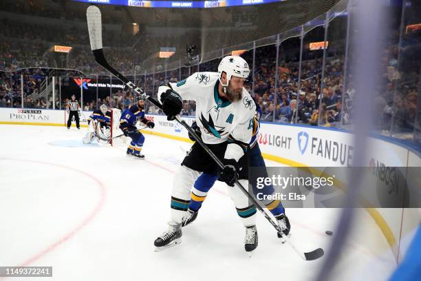 Joe Thornton of the San Jose Sharks looks for the puck against the St. Louis Blues during the first period in Game Three of the Western Conference...