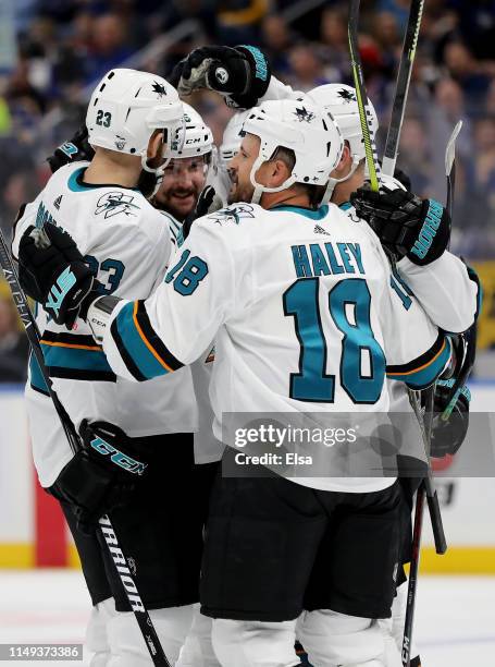 Barclay Goodrow, Brenden Dillon, Joonas Donskoi and Micheal Haley of the San Jose Sharks celebrate a goal scored by Erik Karlsson against the St....