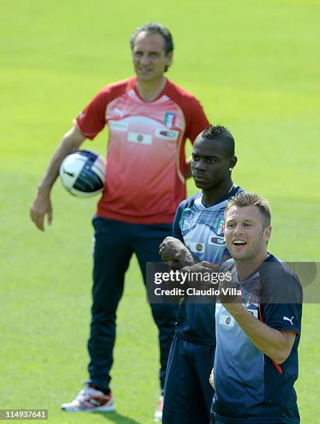 Italy head coach Cesare Prandelli, Mario Balotelli and Antonio Cassano of Italy during a training session at Coverciano on May 30, 2011 in Florence,...