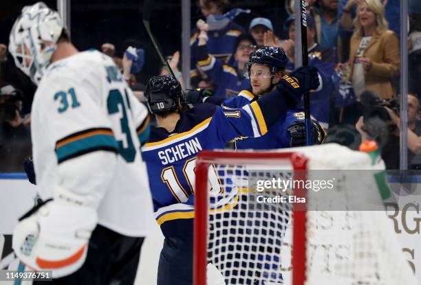 Vladimir Tarasenko of the St. Louis Blues celebrates with Brayden Schenn after scoring a goal on Martin Jones of the San Jose Sharks during the...