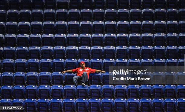 St. Louis Cardinals fan watches the game between the Miami Marlins and the St. Louis Cardinals at Marlins Park on June 11, 2019 in Miami, Florida.