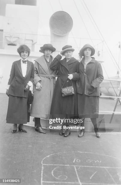 Physicist Marie Curie arrives in New York with her daughters Irene and Eve on the 'RMS OIympic', to raise funds for her research on radium, 1921....