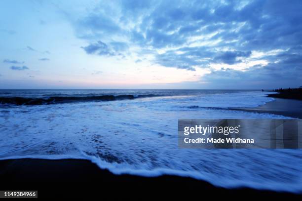 wave, cloud and beautiful sunset sky - made widhana stock pictures, royalty-free photos & images
