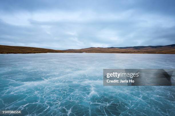 lake baikal frozen in ice - gefrorener see stock-fotos und bilder