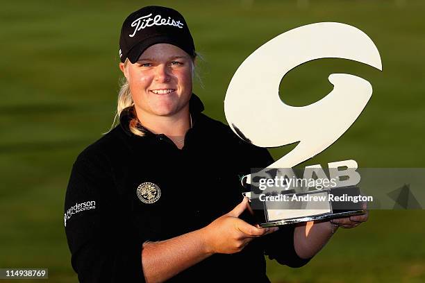 Caroline Hedwall of Sweden poses with the trophy after winning the PowerPlay Ignition Golf on the Twenty Ten Course at the Celtic Manor Resort on May...