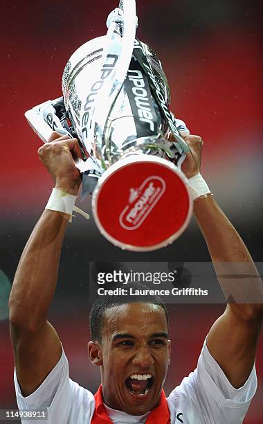 Scott Sinclair of Swansea celebrates with the trophy after victory in the npower Championship Playoff Final between Reading and Swansea City at...