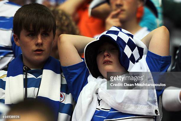 Reading fans look dejected as they applaude the players after defeat in the npower Championship Playoff Final between Reading and Swansea City at...