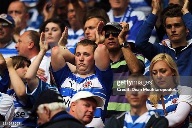 Reading fans look dejected as they applaude the players after defeat in the npower Championship Playoff Final between Reading and Swansea City at...