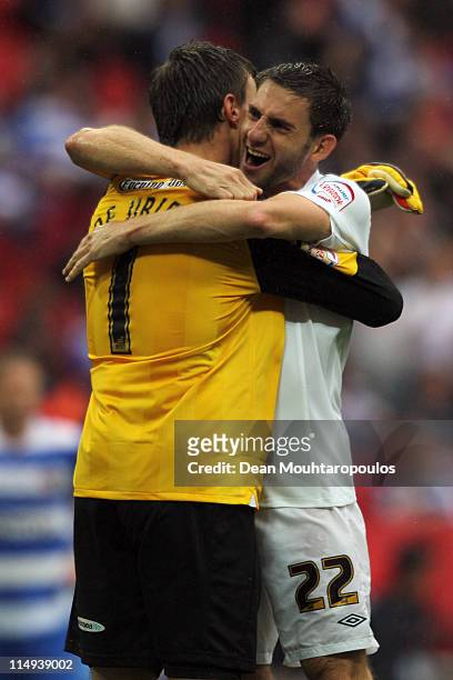 Goalkeeper, Dorus De Vries and Angel Rangel of Swansea celebrate after winning the npower Championship Playoff Final between Reading and Swansea City...