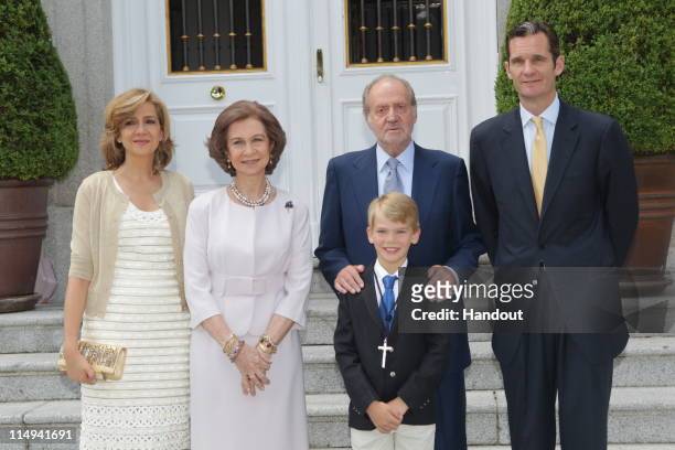 In this handout provided by the Spainish Royal House, King Juan Carlos I of Spain and Queen Sofia of Spain pose with His Excellency, Don Miguel...