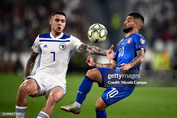 Lorenzo Insigne of Italy competes for the ball with Muhamed Besic of Bosnia and Herzegovina during the UEFA Euro 2020 Qualifier football match...