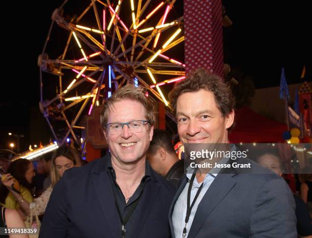 Executive producer/screenwriter Andrew Stanton and Dominic West attend the world premiere of Disney and Pixar's TOY STORY 4 at the El Capitan Theatre...