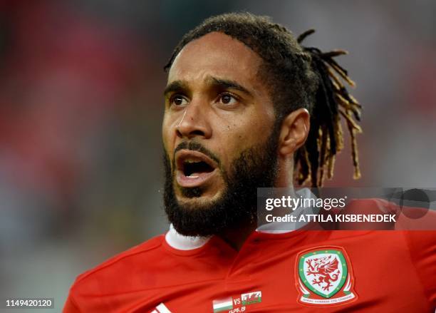 Wales' defender Ashley Williams sings their national anthem prior to the UEFA Euro 2020 qualifier Group E football match Hungary against Wales on...