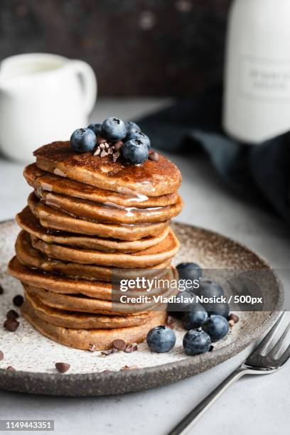 stack of buckwheat pancakes with blueberries - wholegrain stock pictures, royalty-free photos & images