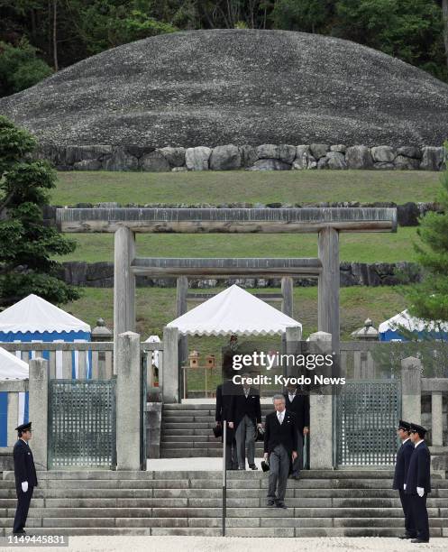 Former Japanese Emperor Akihito is pictured after visiting the mausoleum of Emperor Meiji in Kyoto on June 12, 2019. ==Kyodo