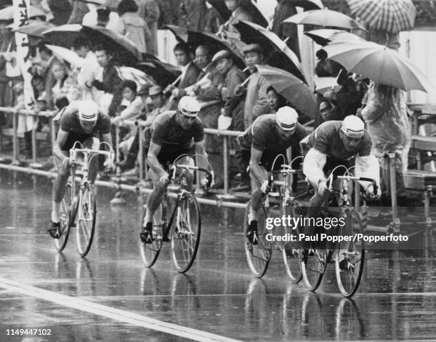 The Great Britain road race cycling team of Robert Addy, Michael Cowley, Derek Harrison and Colin Lewis pictured during competition to finish in 15th...