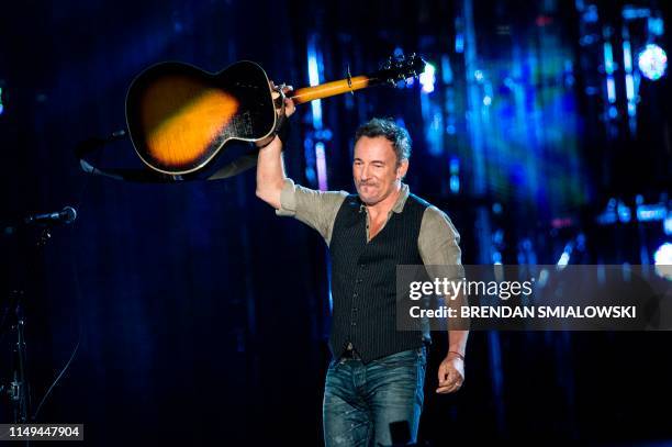 In this file photo taken on November 11, 2014 Bruce Springsteen performs during "The Concert for Valor" on the National Mall in Washington, DC. - The...