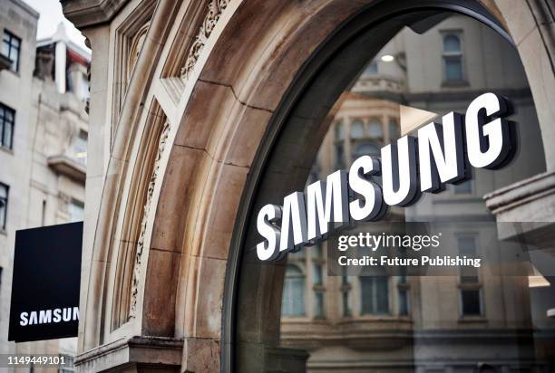 Detail of the Samsung logo in the window of the Samsung Experience Store on Oxford Street in London, taken on June 4, 2019.