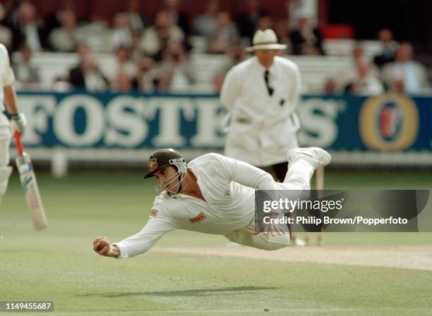 Australian substitute fielder Matthew Hayden takes the catch to dismiss England batsman Robin Smith for 5 runs in the 2nd innings of the 2nd Test...