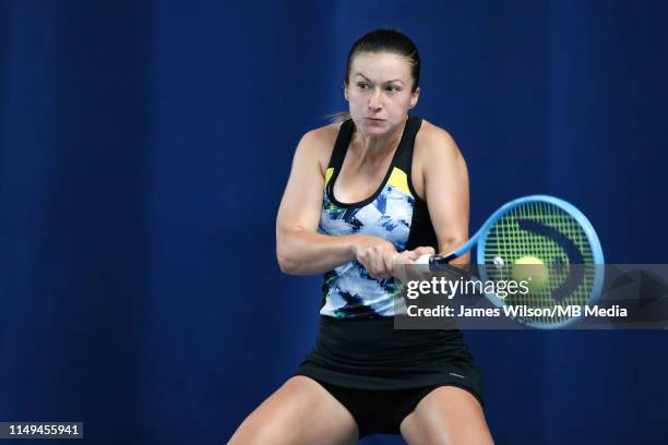 Dalila Jakupovic of Slovakia in action against Donna Vekic of Croatia during day three of the Nature Valley Open at Nottingham Tennis Centre on June...