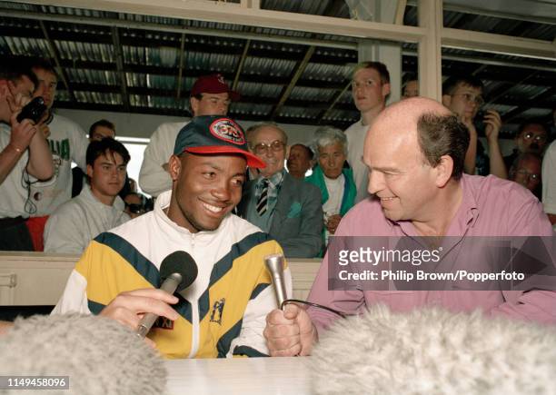 Brian Lara of Warwickshire talks to BBC sports reporter Pat Murphy after his record score of 501 not out in the Britannic Assurance County...