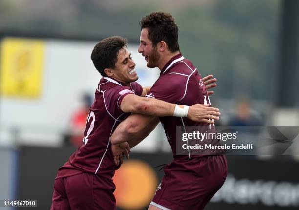 Tedo Abzhandadze of Georgia U20 celebrates with teammates after scoring a try during a Pool C match between Georgia U20 and Scotland U20 as part of...