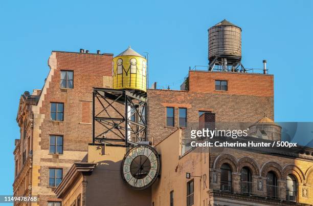 roof top and a clock - hunter, new york stock-fotos und bilder
