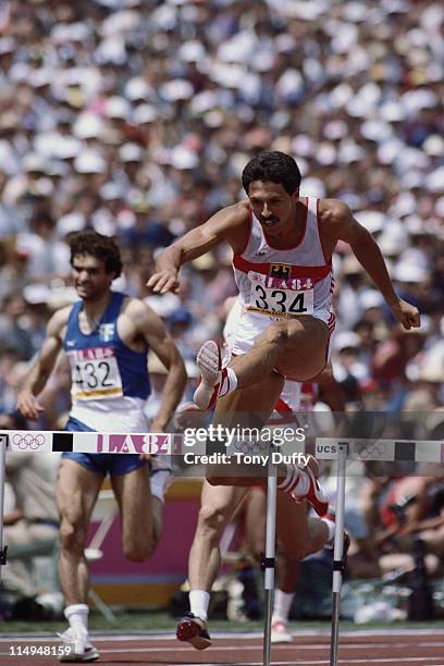 Harald Schmid of West Germany clears the hurdles on his way to a bronze medal in the Men's 400 metre Hurdles during the XXIII Summer Olympics on 5th...