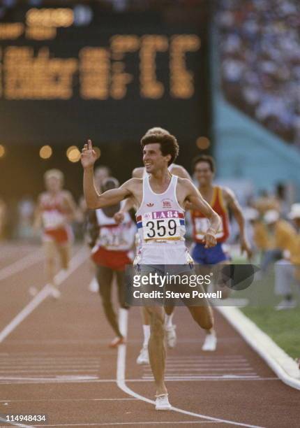 Sebastian Coe of Great Britain crosses the finishing line and celebrates winning the final of the Men's 1500 metres event at the XXIII Summer...