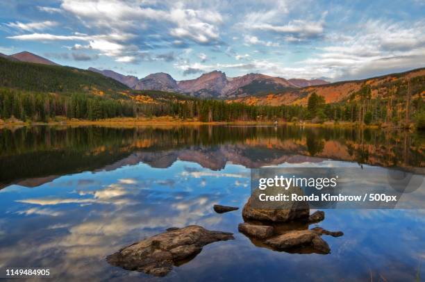 fall on sprague lake in rocky mountain national park - otis massachusetts stock pictures, royalty-free photos & images