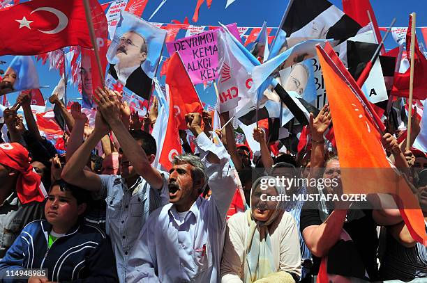 Supporters of main opposition Republican People's Party Kemal Kilicdaroglu wave party flags during a campaign meeting on May 31, 2011 in the...