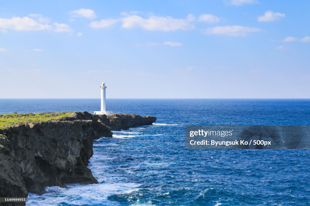 White Lighthouse In Cape Zanpa In Okinawa, Japan