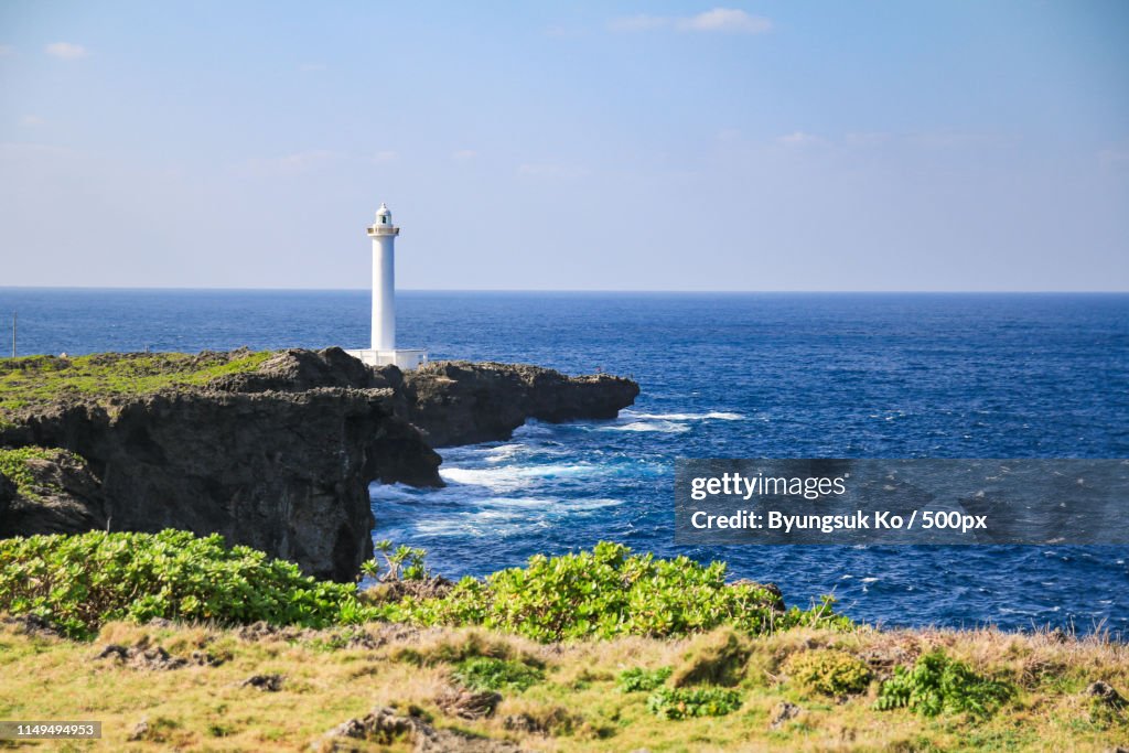 White Lighthouse In Cape Zanpa In Okinawa, Japan