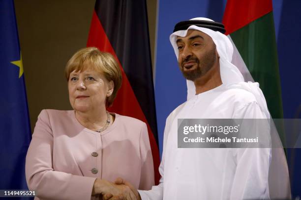 The Crown Prince of Abu Dhabi, Mohammed bin Zayed Al Nahyan, and German Chancellor Angela Merkel speak to the media prior to talks at the Chancellery...