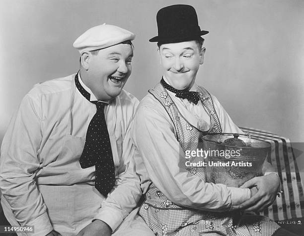 American comic actors Stan Laurel and Oliver Hardy , circa 1930.