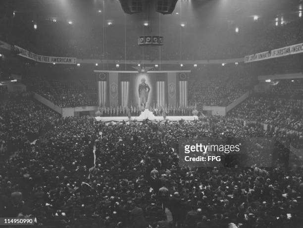 Flags, swastikas and a portrait of George Washington at a meeting of the German American Bund held at Madison Square Garden, New York City, 20th...