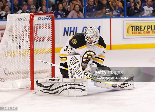 Tim Thomas of the Boston Bruins makes a saves against the Tampa Bay Lightning in Game Six of the Eastern Conference Finals during the 2011 NHL...
