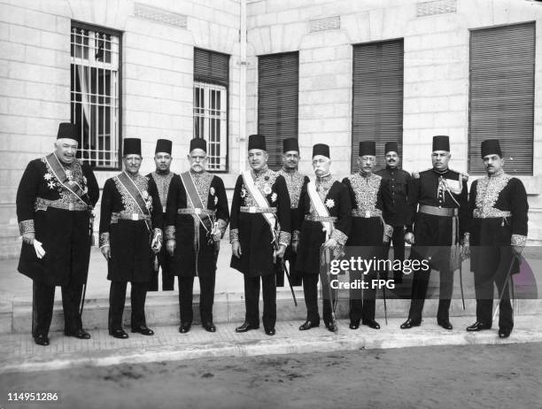 Egyptian government ministers outside the Royal Palace in Cairo before an audience with King Fuad I, circa 1925. Left to right: Prime Minister Ahmad...
