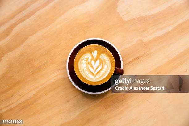 latte art, directly above view - coffee art stockfoto's en -beelden